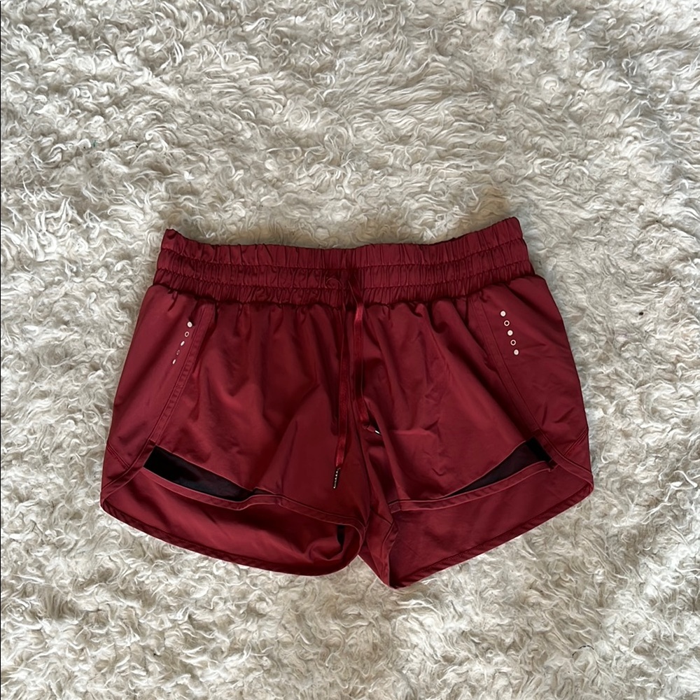 Red Athletic Shorts with Elastic Waistband and Lightweight Fabric